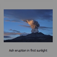 Ash eruption in first sunlight